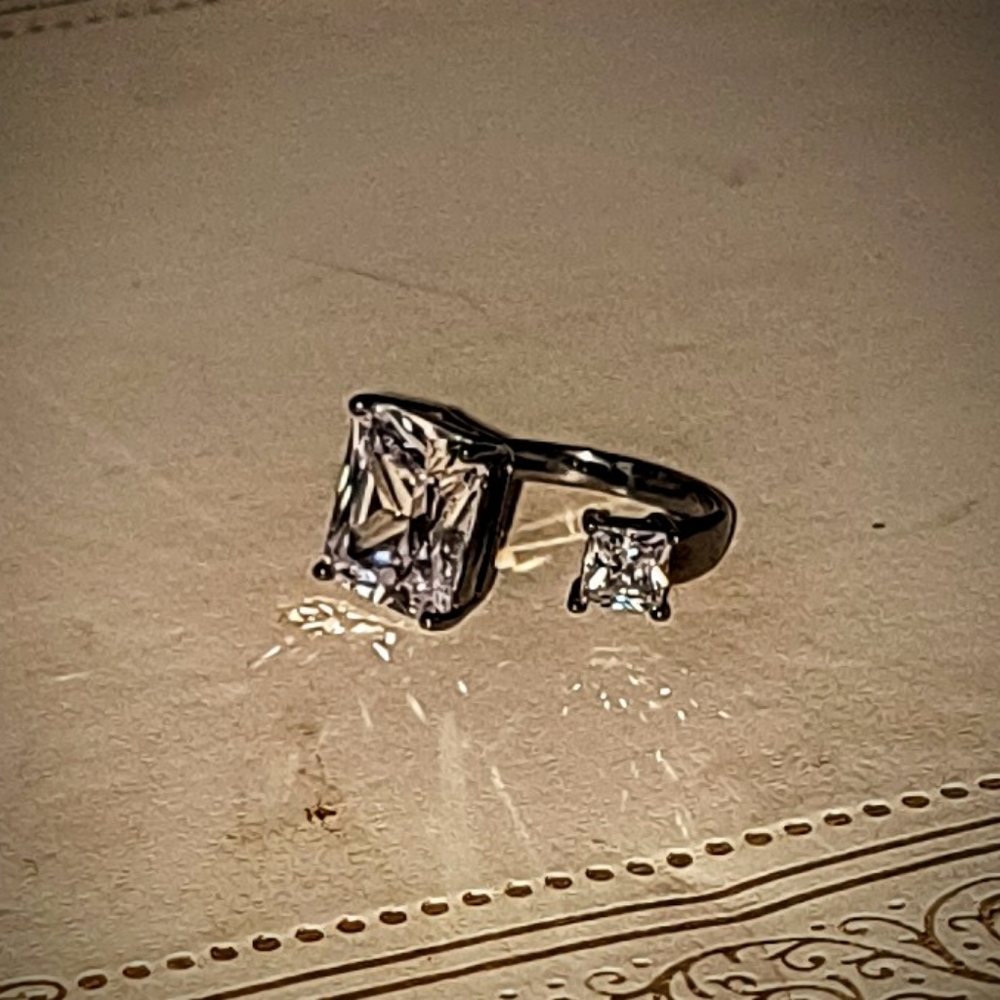 Cushion and princess cut ring